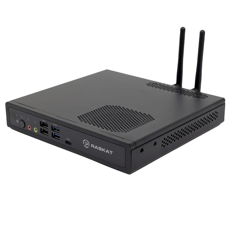 Фото-1 Настольный компьютер RASKAT Standart 507 Mini PC, вид спереди сверху под углом; на фото чёрный компактный корпус с двумя внешними антеннами, вентиляционными отверстиями и передней панелью с USB-портами, аудиоразъёмами и кнопкой питания, что важно для страницы товара с обзором форм-фактора mini PC.