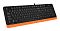 Фото-4 Клавиатура A4Tech F1010 (Orange), ракурс под углом справа: видны цифровой блок, стрелки и верхняя панель с индикаторами, оранжевая нижняя часть корпуса; важно для понимания формы и наличия numpad на странице товара.