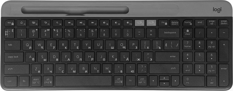 Фото-1 Клавиатура Logitech K580 920-009208, вид сверху: чёрный корпус с серебристой верхней планкой, продольным пазом-подставкой для смартфона или планшета, русско-латинской раскладкой и цифровым блоком; изображение на светлом фоне для карточки товара, показывает полную раскладку и встроенную подставку.