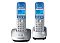 Фото-2 DECT‑телефон Panasonic KX‑TG2512RU: две трубки на базах, вид спереди; сине‑белые трубки, серебристые основания, синие экраны и круглая навигация; на белом фоне — важно для сравнения фронтального вида и подтверждения комплектации.