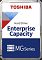 Фото-1 Жёсткий диск 3.5" Toshiba Enterprise Capacity MG10SDA600E, вид спереди: белая информационная наклейка Toshiba на серебристом корпусе, видны винты и штамповка крышки; на белом фоне для карточки товара, чтобы различать модель и серию на странице HDD.