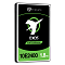 Фото-3 HDD Seagate Exos 10E2400 ST1800MM0129 2,5&Prime;, наклонный ракурс: видна толщина корпуса и серебристая окантовка, чёрно‑зелёная лицевая этикетка с маркировкой серии; тёмный фон для сравнения габаритов и формы.