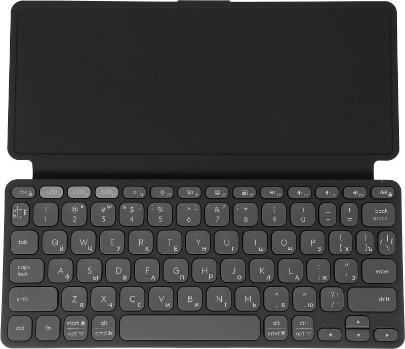Фото-1 Клавиатура Logitech Keys-To-Go 2, вид спереди сверху на тёмно-серую компактную клавиатуру с защитной крышкой-обложкой; видны низкопрофильные клавиши, русско-английская раскладка и укороченный формат без цифрового блока. Подходит для страницы товара, чтобы показать раскладку и встроенную крышку.