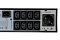 Фото-3 ИБП Systeme Electric Smart-Save Online SRT G2 1000 VA SRTSE1000RTXLIG2, крупный план выходной группы: восемь IEC-розеток в два ряда, одна евророзетка 220 В и входной разъём IEC на металлической задней панели; фото показывает схему подключения нагрузки в карточке товара.