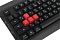 Фото-11 Клавиатура A4Tech Bloody Q100, крупный план клавиш WASD слева. На фото видны красные игровые клавиши, чёрные соседние клавиши и декоративный рисунок на левом крае корпуса. Изображение показывает выделенную игровую зону для страницы товара.