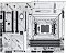 Фото-1 Материнская плата ASUS X870 MAX GAMING WIFI7 W, вид сверху: белая плата с сокетом AM5, четырьмя слотами памяти, несколькими слотами PCIe и крупными радиаторами (VRM, M.2, чипсет); фото показывает общую компоновку для сборки ПК.