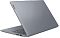 Фото-7 Ноутбук Lenovo IdeaPad Slim 3 15AMN8 82XQ01DNSA, вид сзади справа на крышку; однотонная серая поверхность, тонкие линии корпуса и частично видимая клавиатура. Фото для страницы товара, помогает оценить внешний вид крышки и заднюю часть ноутбука.