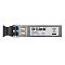 Фото-2 Трансивер D‑Link SFP+ 10GBASE‑LR 432XT‑B1A — вид сбоку; крупно показана боковая этикетка D‑Link с параметрами и значком утилизации, металлический корпус с окнами/прорезями, чёрная защёлка; на белом фоне, помогает сверить маркировку модуля и тип интерфейса SFP+.