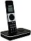Фото-2 Радиотелефон DECT Sanyo RA-SD1002RUS, ракурс 3/4: трубка под углом на базе, видна площадка зарядки, чёрно‑серебристый корпус; на белом фоне; важно для оценки формы базы и устойчивости.