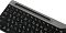 Фото-5 Клавиатура A4Tech Fstyler FBK25 Black, верхняя часть под углом: видны функциональные клавиши, русско-латинская раскладка и длинный паз в серой верхней планке для смартфона или планшета; изображение на белом фоне для карточки товара, показывает встроенную подставку по всей ширине корпуса.