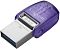 Фото-2 USB‑накопитель Kingston DataTraveler microDuo 3C 64GB, вид под углом: открыт разъём USB‑A с синей вставкой, серебристый металлический корпус и фиолетовый колпачок, на белом фоне &mdash; чтобы увидеть разъём и форму корпуса на странице товара.