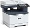 Фото-3 МФУ Xerox VersaLink C415, ракурс спереди слева: виден верхний автоподатчик и сенсорный экран на выносной панели справа, тёмно‑синий центральный блок над выходной зоной; помогает оценить доступ к управлению и выходному тракту.