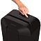 Фото-4 Уничтожитель бумаги Fellowes Powershred LX41, крупный план верхней панели на белом фоне: рука нажимает на переключатель, рядом видны индикаторы, а вдоль щели подачи — пиктограммы; важно для понимания управления и зоны подачи на странице товара.
