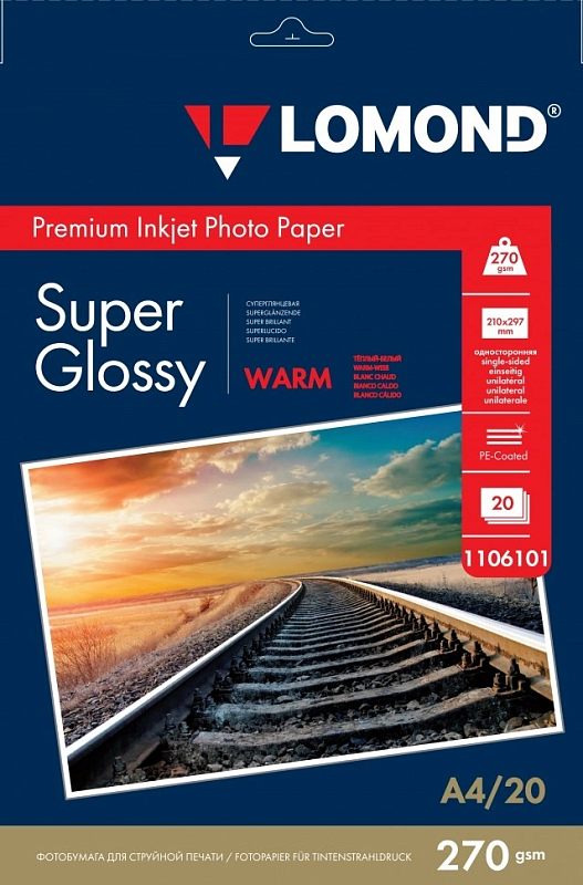 Фото-1 Фотобумага Lomond 1106101 A4 20 листов 270 г/м²: лицевая сторона упаковки «Premium Inkjet Photo Paper Super Glossy Warm», тёмно‑синий фон с красной полосой, фото железнодорожных путей на закате; на белом фоне, чтобы распознать тип покрытия и плотность по упаковке на странице товара.