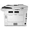 Фото-2 МФУ HP LaserJet Enterprise M430, вид сзади: белый корпус, вентиляционные решётки, справа вертикальный блок разъёмов подключения и ниша питания; помогает увидеть расположение портов и задней панели для подключения в офисе.