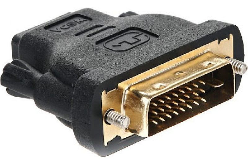 Фото-1 Переходник VCOM DVI-D male — HDMI female VAD7818, крупный план разъёма DVI-D; чёрный корпус, металлический DVI-D штекер с винтовыми креплениями, рельефная поверхность; фото на белом фоне для страницы товара, показывает основной видеоразъём и способ фиксации.