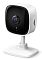Фото-2 Wi-Fi камера видеонаблюдения TP-Link Tapo C100, крупный план: чёрная лицевая панель с объективом и индикатором, белый корпус; справа виден слот microSD и маркировка, поясняющие расположение разъёма.