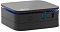 Фото-2 Неттоп iRU 110JLCN Mini PC 2152163, фронтальный вид под углом; видны чёрный корпус с матовой верхней крышкой, круглая кнопка питания по центру, два синих USB-порта, один чёрный USB-порт и декоративная световая полоса вдоль верхней кромки; фото важно для карточки товара, потому что показывает компоновку передней панели.