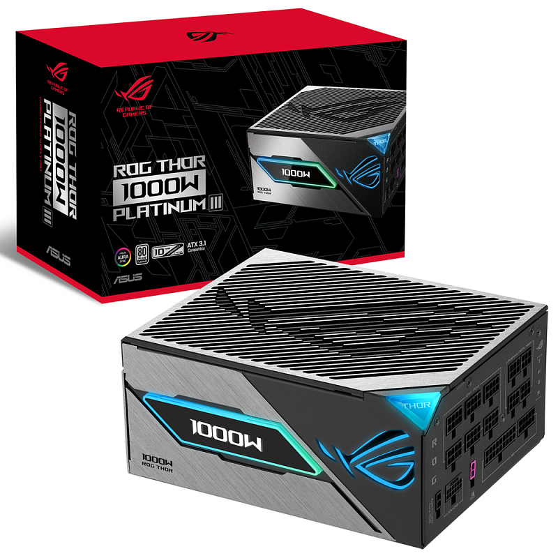 Фото-1 Блок питания для ПК ASUS ROG THOR 1000W Platinum III, общий вид с упаковкой спереди под углом; на фото чёрно-серый корпус с крупной верхней решёткой, боковой подсветкой и модульными разъёмами, рядом коробка с изображением модели; чёрный, серый и красный цвета; снято на светлом фоне для карточки товара, чтобы сразу показать внешний вид устройства и фирменную упаковку на странице модели.