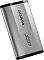 Фото-3 Внешний SSD ADATA SD810 2 ТБ, ракурс под углом: серый корпус с продольными гранями, чёрный торец и резиновая крышка порта, белый фон; важно для понимания конструкции корпуса и защитной крышки.