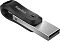 Фото-4 USB-накопитель SanDisk iXpand Go 128 ГБ, вид под углом: металлический корпус и чёрная поворотная ручка, внутри виден разъём Lightning в сложенном положении; на белом фоне &mdash; помогает понять, как разъём прячется в корпусе на странице товара.