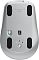 Фото-2 Беспроводная мышь Logitech MX Anywhere 3S, вид снизу. На фото видны четыре тёмные опорные накладки, центральный сенсор, зелёный переключатель питания, круглая кнопка выбора канала и маркировка MX Anywhere 3S на основании; кадр важен для страницы товара, потому что показывает нижнюю конструкцию и органы переключения режимов.