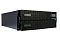 Фото-9 ИБП Systeme Electris Smart Save Online SRT G2 8000 VA SRTSE8KRTXLIG2 NC, крупный план нижней части задней панели, автомат защиты, ряд розеток и зелёная клеммная колодка на чёрно-серой панели; изображение для карточки товара, показывает силовые и сервисные элементы.