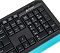 Фото-4 Клавиатура A4Tech F1010 Blue, вид снизу: голубой пластиковый корпус с резиновыми ножками, винтами и откидными опорами, видна сервисная наклейка; изображение показывает конструкцию основания и устойчивость на столе.