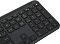 Фото-4 Клавиатура Logitech K950, крупный план правой части раскладки. Видны стрелки, клавиши цифрового блока и низкий профиль чёрных клавиш с белыми обозначениями; фото помогает рассмотреть правую рабочую зону клавиатуры.