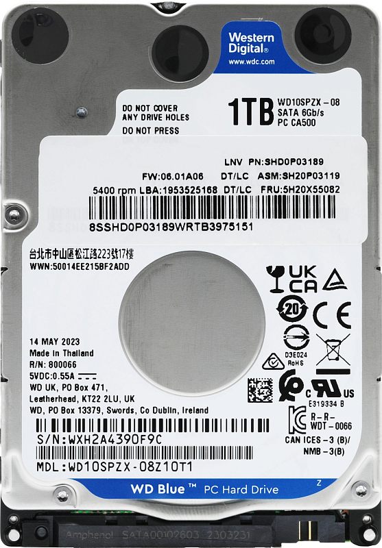 Фото-1 Жёсткий диск Western Digital WD Blue WD10SPZX, вид сверху; белая наклейка с логотипом Western Digital и обозначением 1TB на серебристой крышке, видны винты и круглые углубления; важно для идентификации модели 2,5″.