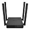 Фото-3 Беспроводной маршрутизатор TP-Link Archer C54 — вид сверху; чёрный корпус с логотипом TP‑Link, четыре антенны по углам, индикаторы на передней панели; на белом фоне; важно для понимания компоновки антенн и формы устройства.