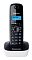 Фото-2 DECT‑телефон Panasonic KX‑TG1611RU: вид спереди, трубка установлена на базе; чёрный корпус трубки и белое основание, синяя подсветка экрана, блок клавиш с центральной навигацией; на белом фоне — важно для сравнения фронтального вида и цветового исполнения.